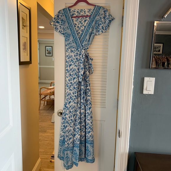 Dresses & Skirts - NWOT. Blue floral wrap maxi dress